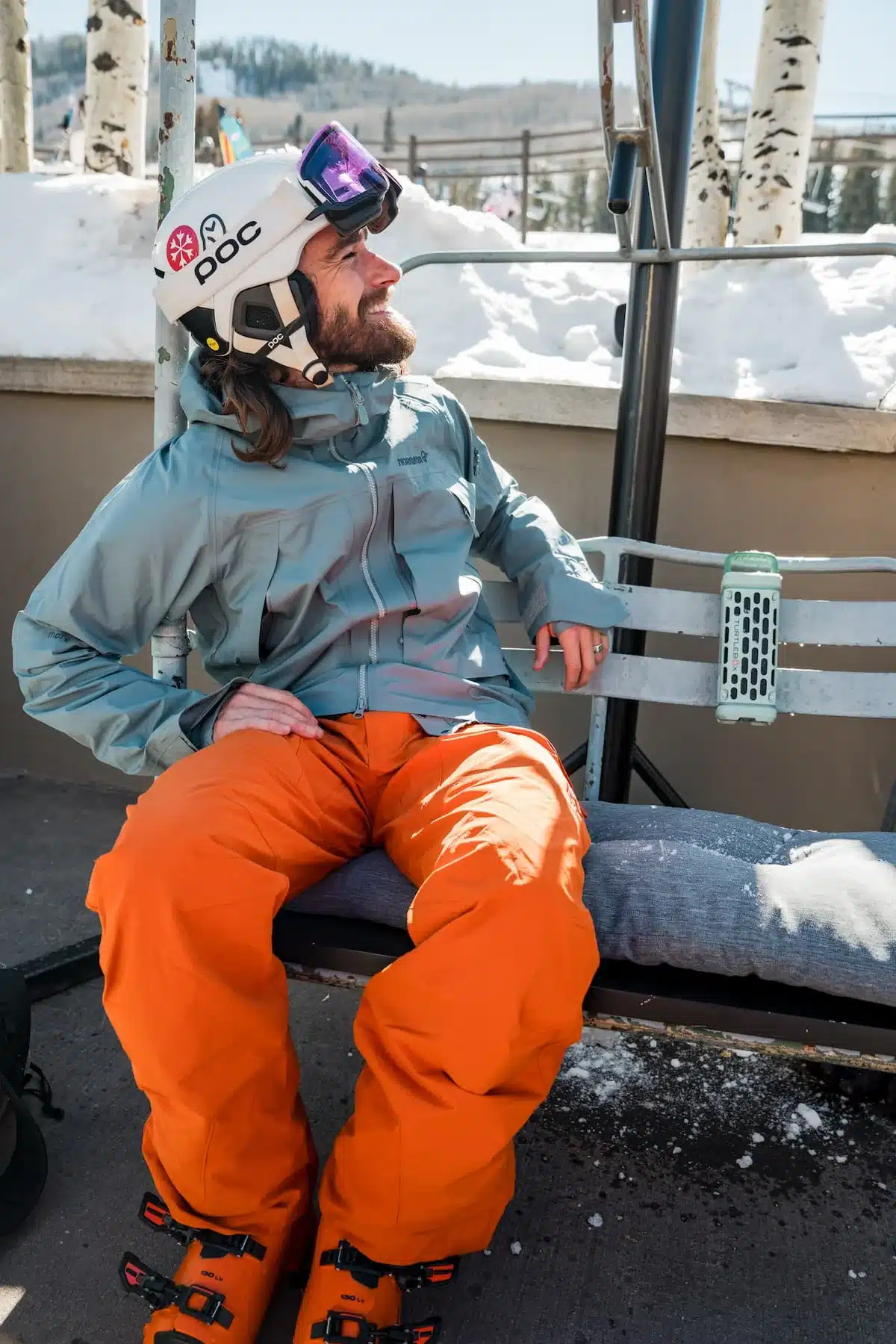 Free Skier Sitted With A River Rock Ranger Attached To Bench